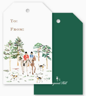 Two Equestrian Toile Gift Tags: one white with a watercolor illustration of two equestrians and three dogs in a forest with “To:” and “From:” text, and one solid dark green holiday gift tag.