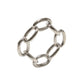 The Kim Seybert Chain Link Napkin Ring Collection features six oval-shaped, textured silver links connected in a circular design, perfect for adding an elegant touch to your table setting.