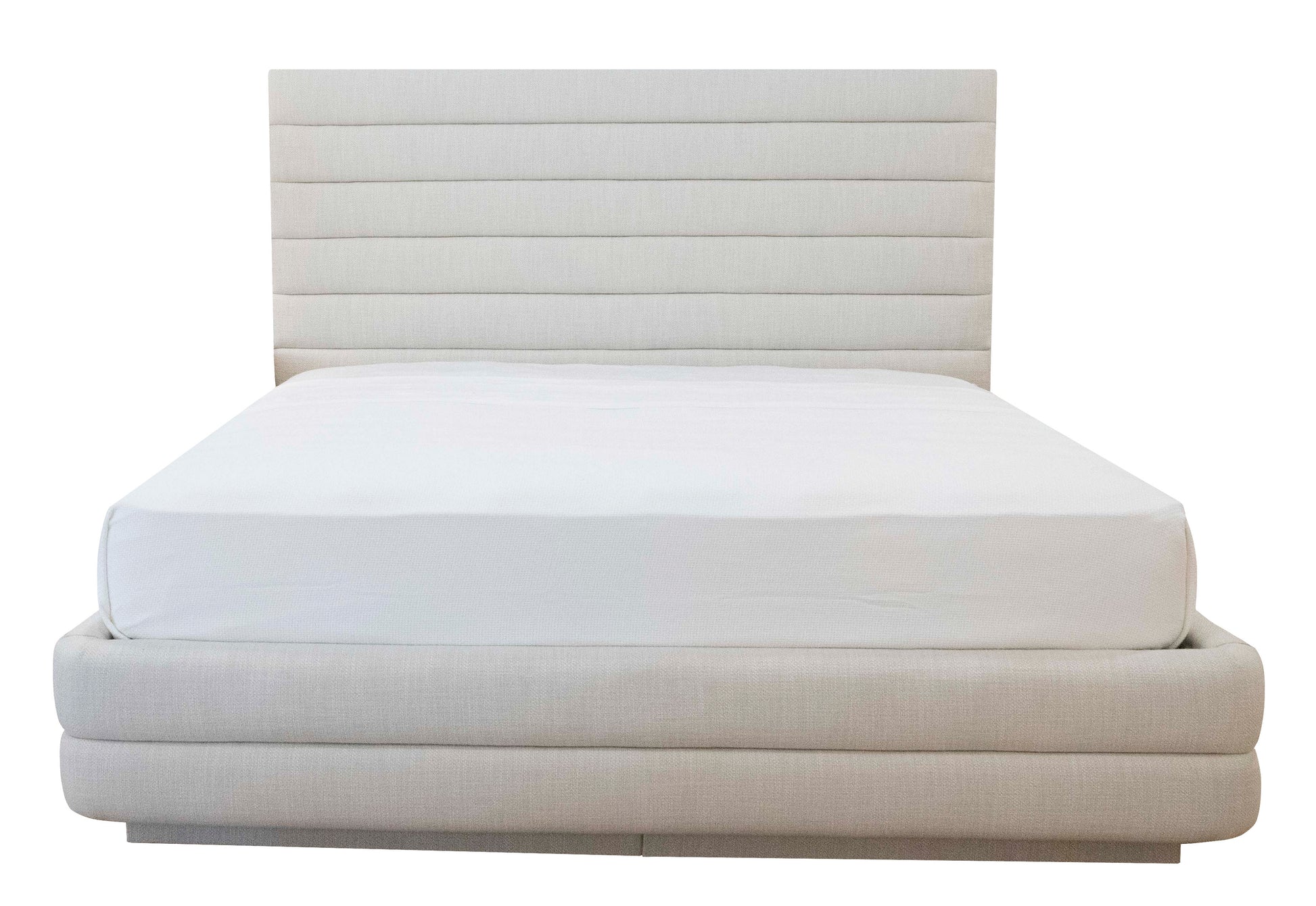 A Channel Bed, King from the EJ Schrader collection, featuring a light beige upholstered headboard and base, complemented by a pristine white mattress.