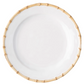 A round white ceramic plate from the Juliska Classic Bamboo Dinnerware Collection, featuring a bamboo-patterned rim, is shown from above on a plain background for an elegant yet casual look.