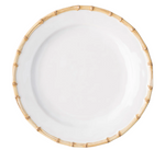 A round white ceramic plate from the Juliska Classic Bamboo Dinnerware Collection, featuring a bamboo-patterned rim, is shown from above on a plain background for an elegant yet casual look.