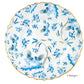 Round porcelain charger plate from Ginori 1735's Oro Di Doccia Turchese Dinnerware Collection, featuring blue and gold floral and bird motifs, a scalloped edge with hand-painted gold trim.