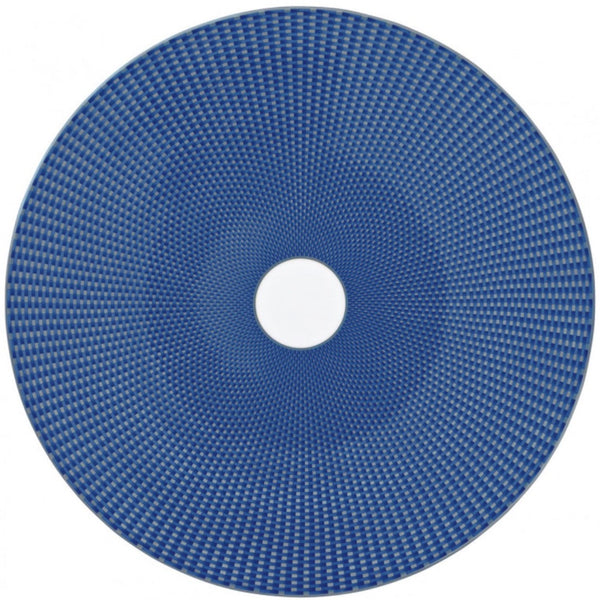 A round, blue, patterned object with a central hole, resembling a textured disc from the Raynaud Tresor Blue Collection by Raynaud.