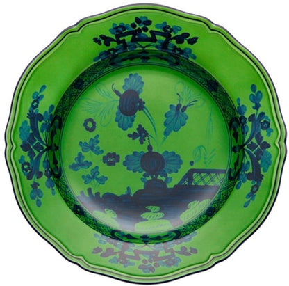 A round, scalloped-edge green plate featuring a dark blue floral and scenic pattern inspired by Ginori 1735's Oriente Italiano Malachite Dinnerware Collection.