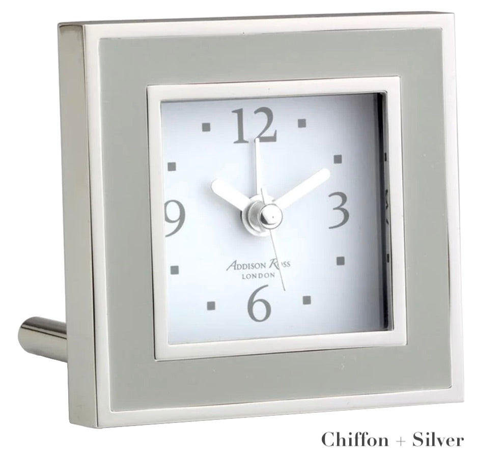 The Addison Ross Square Silver Alarm Clock from the Square Silver Alarm Clock Collection features black numerals and hands, a white face showing 10:10, and "Chiffon + Silver" text at the bottom right—ideal for your bedside table.