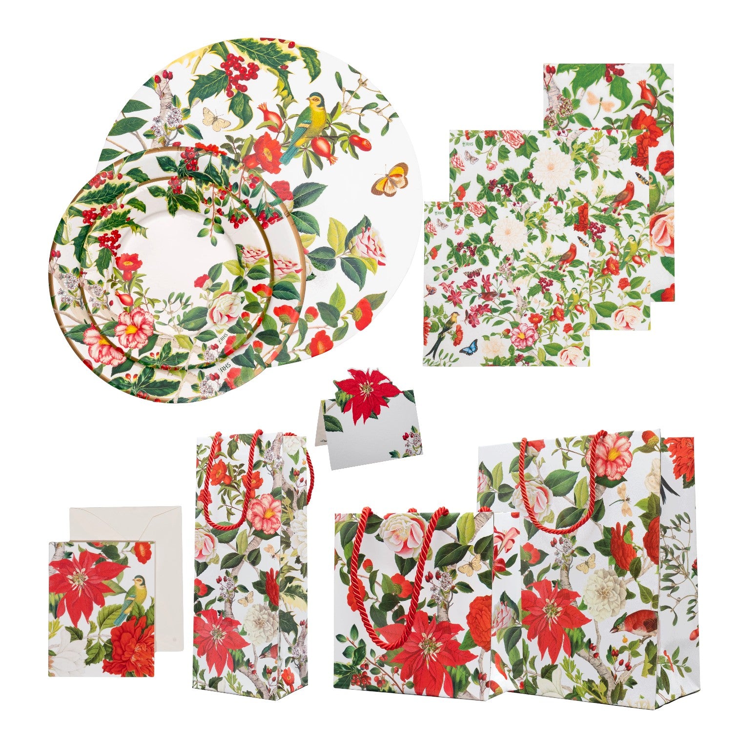 The Caspari Christmas Chinoiserie White Collection features gift bags, cards, and paper dinnerware adorned with colorful floral and bird designs on a white background.
