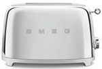 A silver SMEG 2-Slice Toaster Collection with wide slots and the word "Smeg" on it.