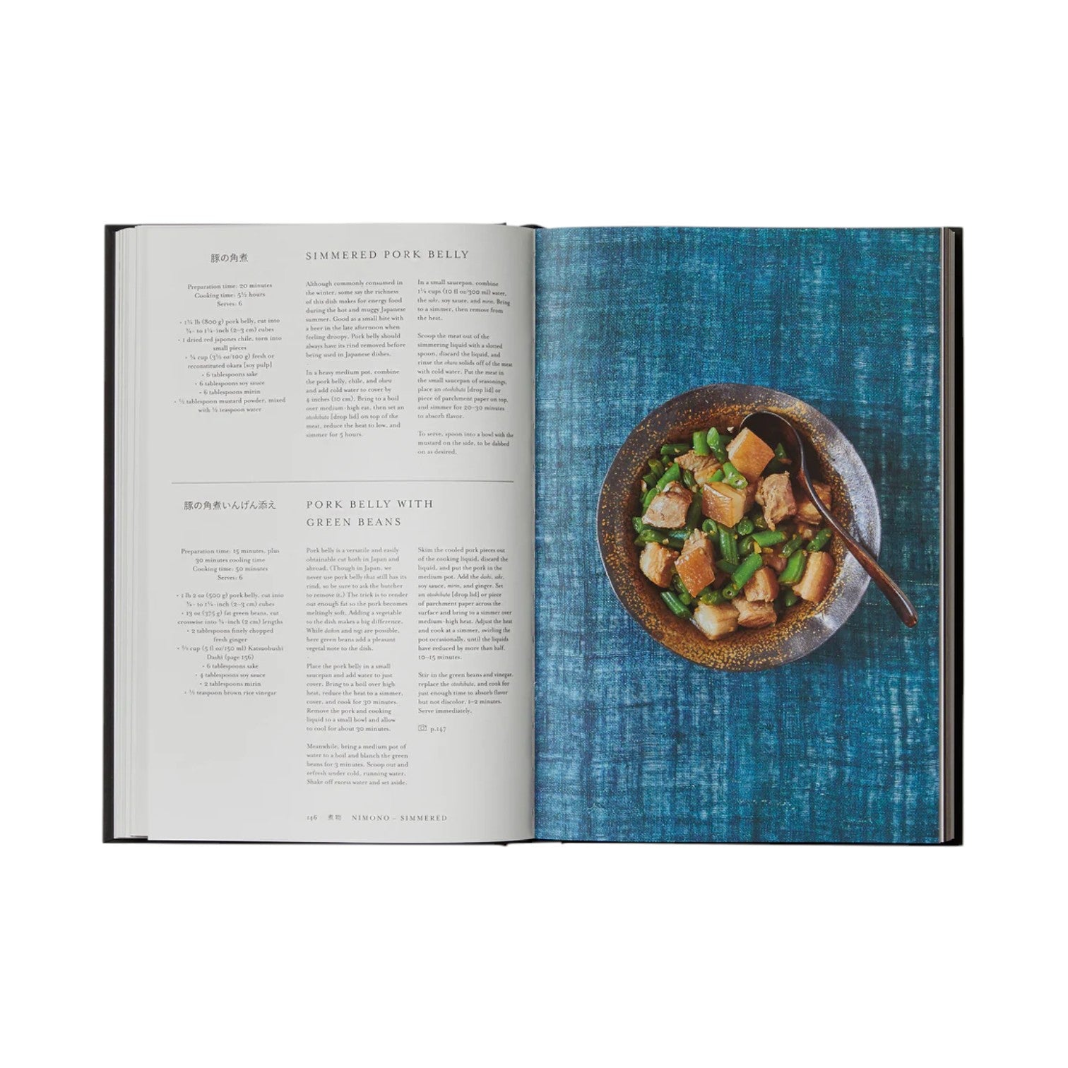 Japan: The Cookbook by Phaidon displays Japanese recipes—simmered pork belly and pork belly with green beans on one page, and a bowl of pork belly with green beans on the opposite page.