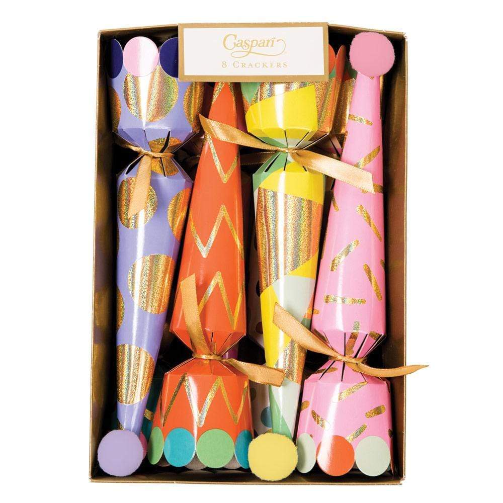 A box of six colorful Caspari Party Hat Crackers with gold accents, elegantly arranged in a gold-edged box—perfect for festive surprises at any celebration.