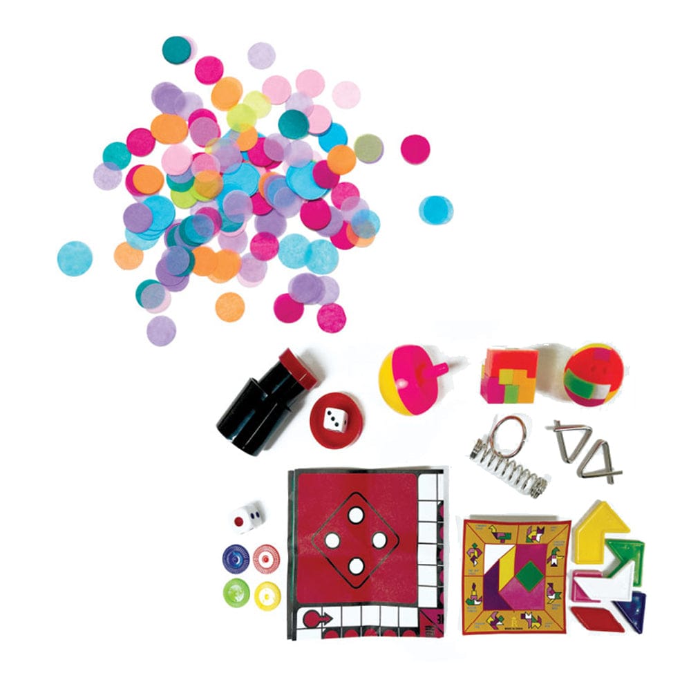 A selection of festive surprises from Caspari Party Hat Crackers—including confetti, game pieces, dice, tokens, a spinner, puzzle pieces, a spring, and tops—arranged on a white background.