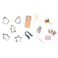Assorted items like cookie cutters, colored pencils, a cheese grater, tape measure keychain, playing cards, star magnet, and mini screwdriver—ideal as fillers for Caspari's Christmas Trees with Lights Crackers or as festive luxury embellishments.