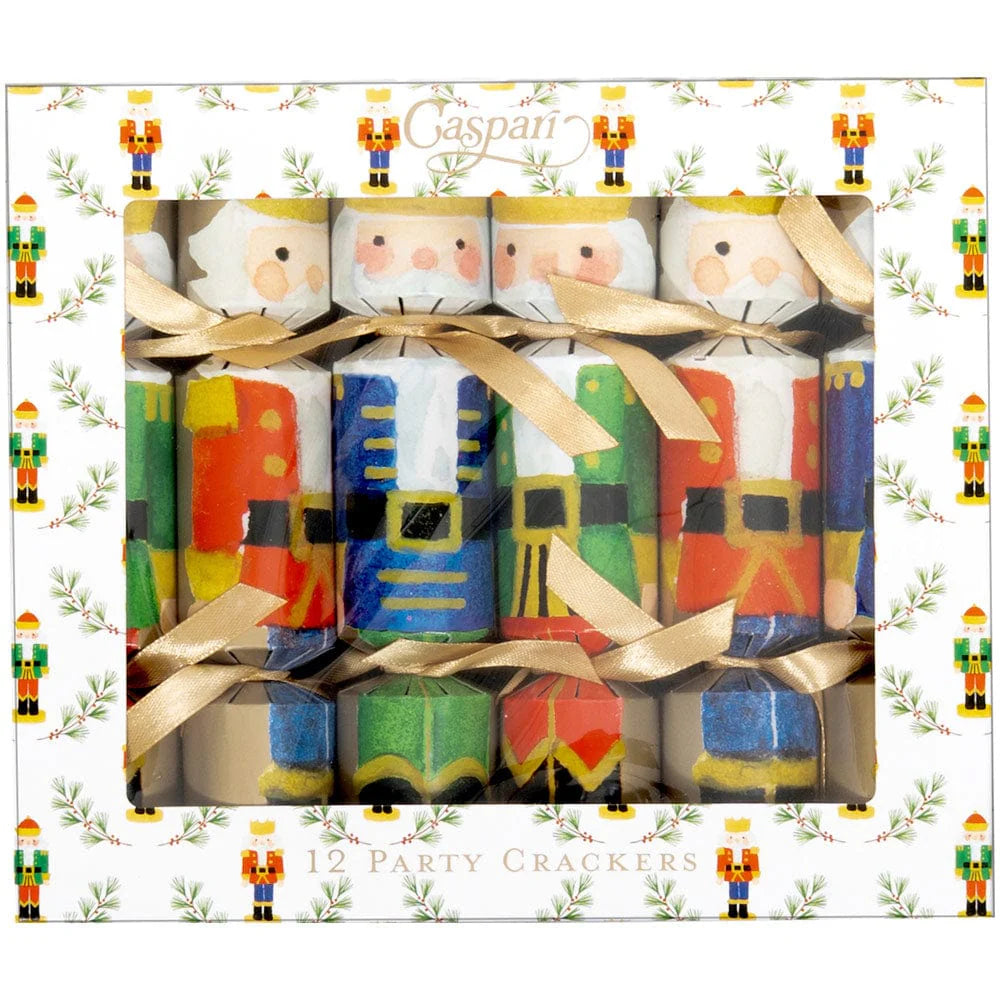 Caspari’s Painted Nutcrackers Celebration Cracker Set includes 12 toy soldier crackers tied with gold ribbons, beautifully packaged in a festive Nutcracker box—perfect party favors for your holiday celebration.