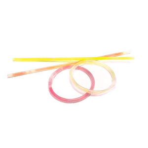Two Caspari Celebrate! Crackers, shown on a white background, make vibrant party favors and festive surprises.