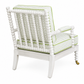 The Spool Chair by Hickory Chair features a spindle-style back and arms in the classic bobbin-frame design, accented with green and white light-patterned upholstery, green trim, and a small brass caster on one front leg. Shown from the back against a white background.