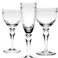Three clear, stemmed bridal glasses from the Claire Collection by William Yeoward Crystal, featuring a decorative dotted band near the rims—stylish tableware to elevate any celebration.