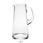 The Classic Pitcher Collection by William Yeoward Crystal features a clear glass pitcher with a handle, ideal for serving water or juice. Shown empty and upright on a white background, "4 pint" below indicates its capacity.