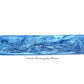 A blue, marbled rectangular platter with rounded edges from the Denim Resin Serveware Collection by Nashi Home, crafted from shatter-resistant resinware—an elegant touch for any home decor, shown on a white background.