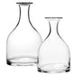 Two clear, wide-bottomed glass carafes from the Classic Carafe Collection by William Yeoward Crystal are displayed side by side on a white background.