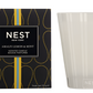 A box labeled "Nest Amalfi Lemon & Mint Collection" stands beside an empty frosted candle holder, evoking the refreshing essence of this collection inspired by the Amalfi Coast.