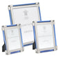 The Light Blue Classic Frame Collection by William Yeoward Crystal features three rectangular frames with blue accents and nickel-plated silver borders, available in assorted sizes.