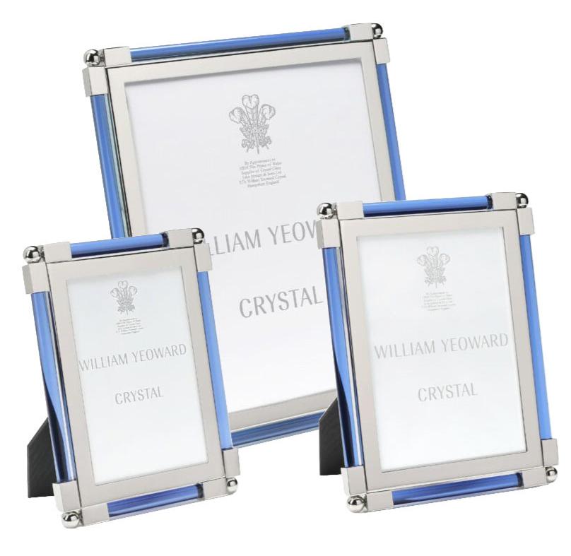 The Light Blue Classic Frame Collection by William Yeoward Crystal features three rectangular frames with blue accents and nickel-plated silver borders, available in assorted sizes.