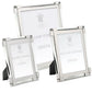 Three frames from the Clear Classic Frame Collection by William Yeoward Crystal, crafted with silver-toned glass and nickel-plated edges in varied sizes, display placeholders reading "William Yeoward Crystal.