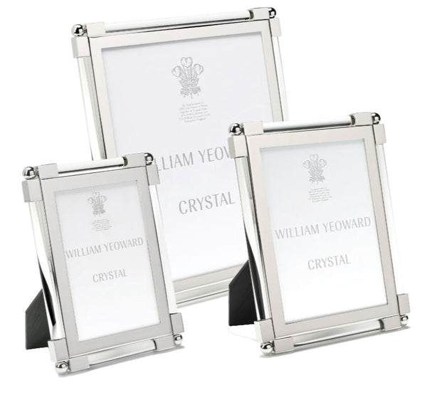 Displayed on a white background are three William Yeoward Crystal Classic Frames from the Clear Collection, featuring varying sizes and a bright finish.