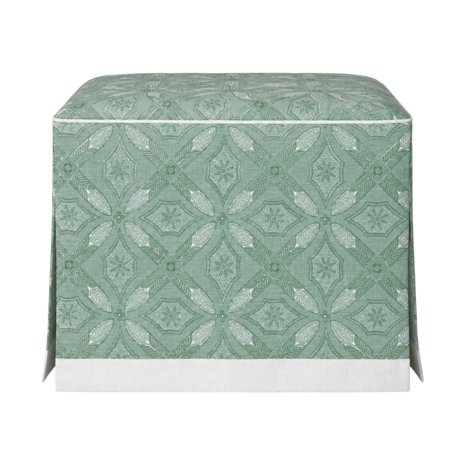 The Hickory Chair Cocktail Ottoman features a green and white patterned fabric cover with geometric and floral motifs, a dressmaker skirt for added elegance, and a white base trim. Made to measure for your unique space.
