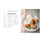 An open copy of The College Kitchen by Penguin Random House displays a breakfast burrito recipe on the left page, while the right shows a plate with two filled burritos, beans, salsa, and avocado next to a glass of water—the perfect inspiration for easy student meals.