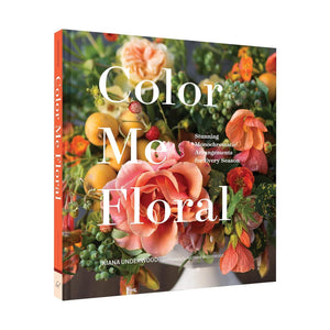 The cover of “Color Me Floral” from Chronicle Books features a vibrant floral arrangement set against a white background, capturing the book’s focus on stunning monochromatic blooms and inventive floral designs.