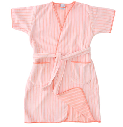 The Weezie Towels Short Plush Robe features light pink and white stripes, short sleeves, two front pockets, a waist belt, and plush velour fabric for luxury. Shown on a plain white background.
