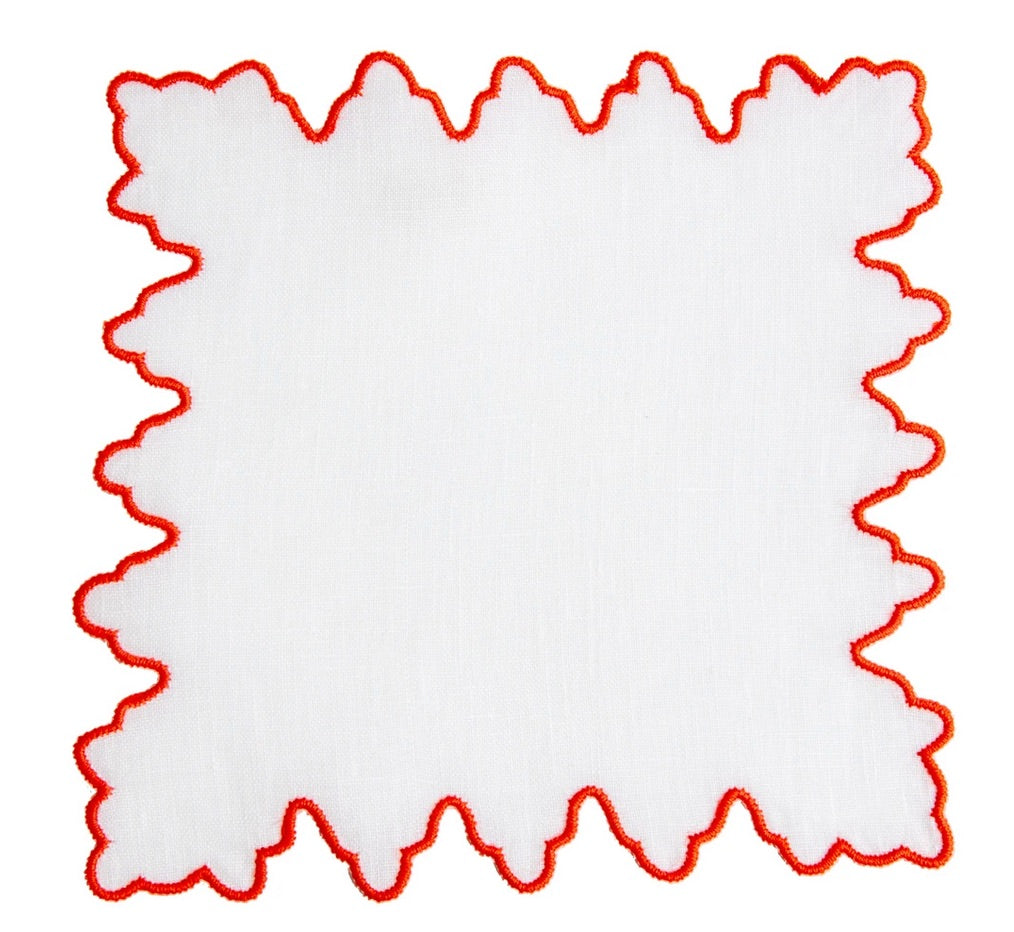 The Haute Home Sultan Coaster Set features a white, square cloth napkin with scalloped red edges—an elegant touch for your table and a perfect match for linen coasters.