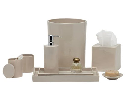 The Cordoba Bath Collection by Pigeon & Poodle features a beige ceramic design with burlap texture and includes a soap dispenser, tumbler, cotton jar, tissue box, tray, perfume bottle, and soap dish with soap.