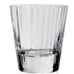 A clear, empty Corinne Collection tumbler by William Yeoward Crystal, featuring a vertical optic design, stands on a plain white background.