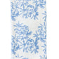 The Weezie Towels x Meg Braff Bath Collection showcases a folded white towel with a light blue floral pattern and scallop trim, capturing Palm Beach's breezy charm.
