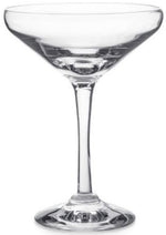 The Vintner Drinkware Collection coupe glass by Simon Pearce features a wide bowl, short stem, and flat base in handblown glass, displayed empty against a plain white background.