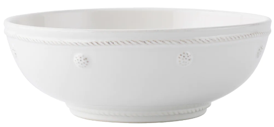 A white ceramic pasta bowl from Juliska’s Berry & Thread Classic Whitewash Dinnerware Collection, featuring a slightly flared rim with raised dot and rope-like patterns around the edge.