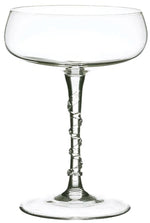 A clear coupe glass from the Juliska Amalia Drinkware Collection with a twisted stem and detailed base, displayed empty against a white background.