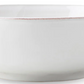 The Juliska Puro Whitewash Dinnerware Collection features a plain white ceramic bowl with a slightly flared rim and small base, perfect for any neutral palette, photographed against a white background.