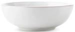 The Juliska Puro Whitewash Dinnerware Collection features a plain white ceramic bowl with a slightly flared rim and small base, perfect for any neutral palette, photographed against a white background.