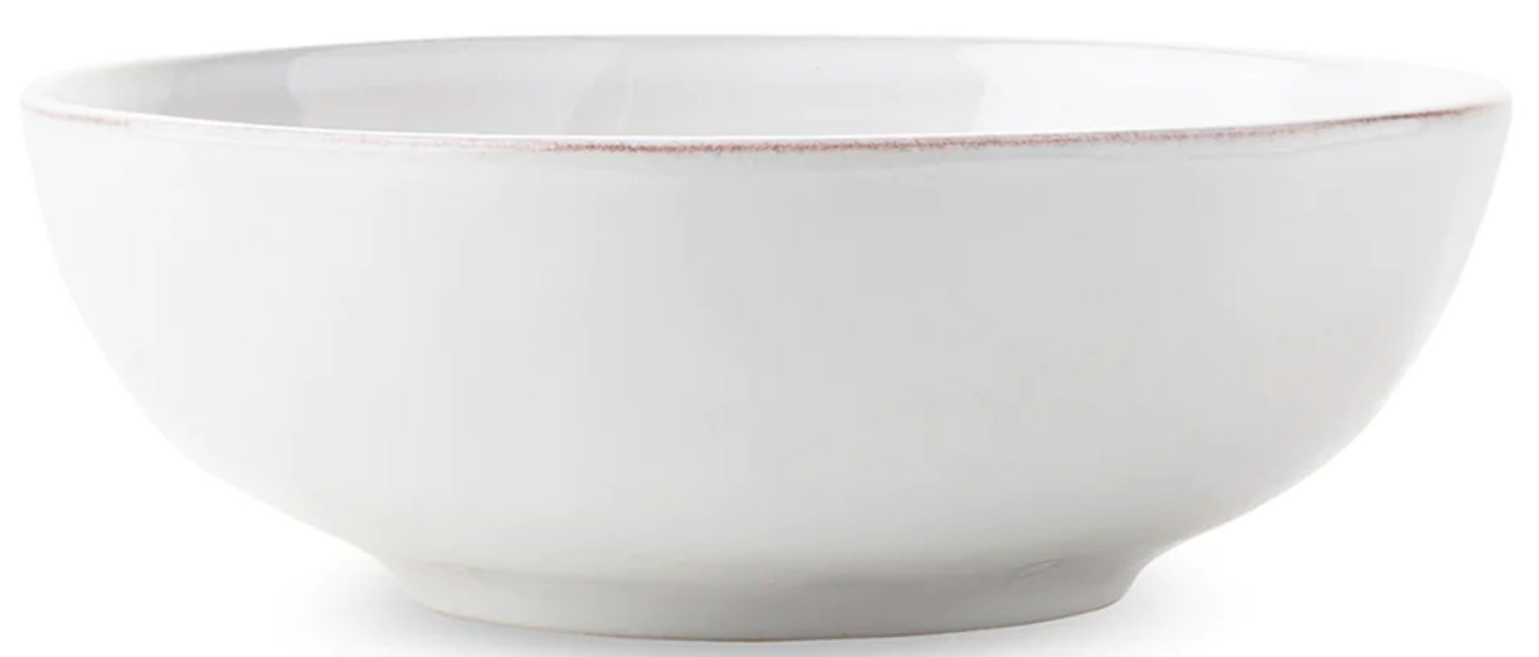 The Juliska Puro Whitewash Dinnerware Collection features a plain white ceramic bowl with a slightly flared rim and small base, perfect for any neutral palette, photographed against a white background.