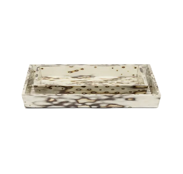 Two nested rectangular trays from the Bisbee Bath Collection featuring a cream and brown birdseye burl veneer mottled pattern.