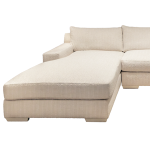 A cream-colored Hickory Chair Vistage Sectional with a left-facing chaise lounge, featuring plush cushions and textured fabric, isolated on a white background.