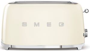 A cream-colored Smeg SMEG 4-Slice Toaster Collection with two slots and 6 browning levels.