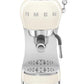 A cream-colored Smeg espresso machine from the SMEG Espresso Machine Collection, designed with a portafilter and steam wand, offers 15 bar pressure and an Adjustable Cappuccino system for perfect brews.