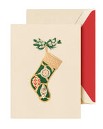 The Classic Stocking Card Set by Crane features a vintage Christmas stocking with ornaments and greenery, paired with a red envelope on signature Crane paper.