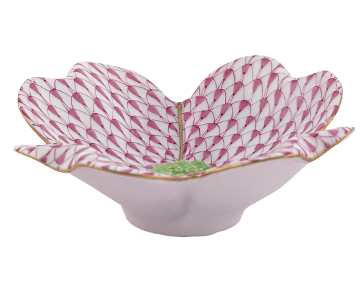Herend's Dogwood Flower bowl is a pink and white porcelain piece with petal-shaped ceramic design, featuring hand-painted green accents from the Herend brand.