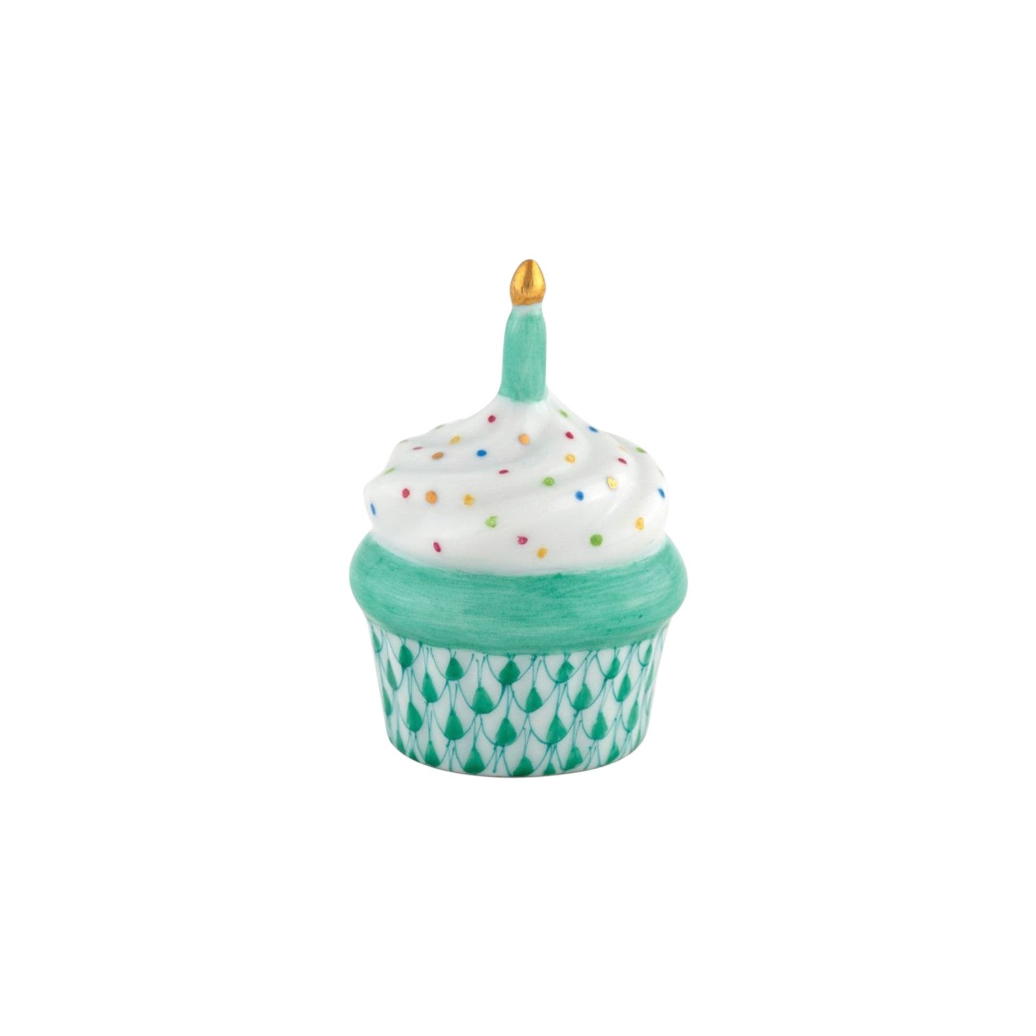 The Herend Cupcake with Candle is a hand-painted porcelain trinket box featuring a green base, white frosting with colorful dots, and a single candle—an artisanal decorative accent.