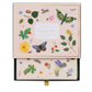 A box of thank you cards from the Curio Desk Accessory Collection by Riffle Paper Co., featuring botanical, butterfly, and illustrated bug designs—perfect for garden lovers. The partially open lid reveals beautifully coordinated cards inside.