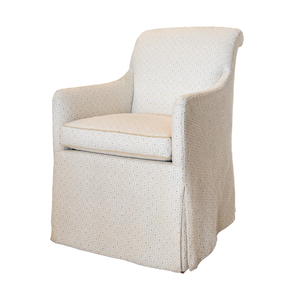 The Lindsay Chair by Hickory Chair is an upholstered armchair featuring a patterned fabric, skirted base, cushioned seat, and curved armrests; this versatile host chair is shown against a white background.